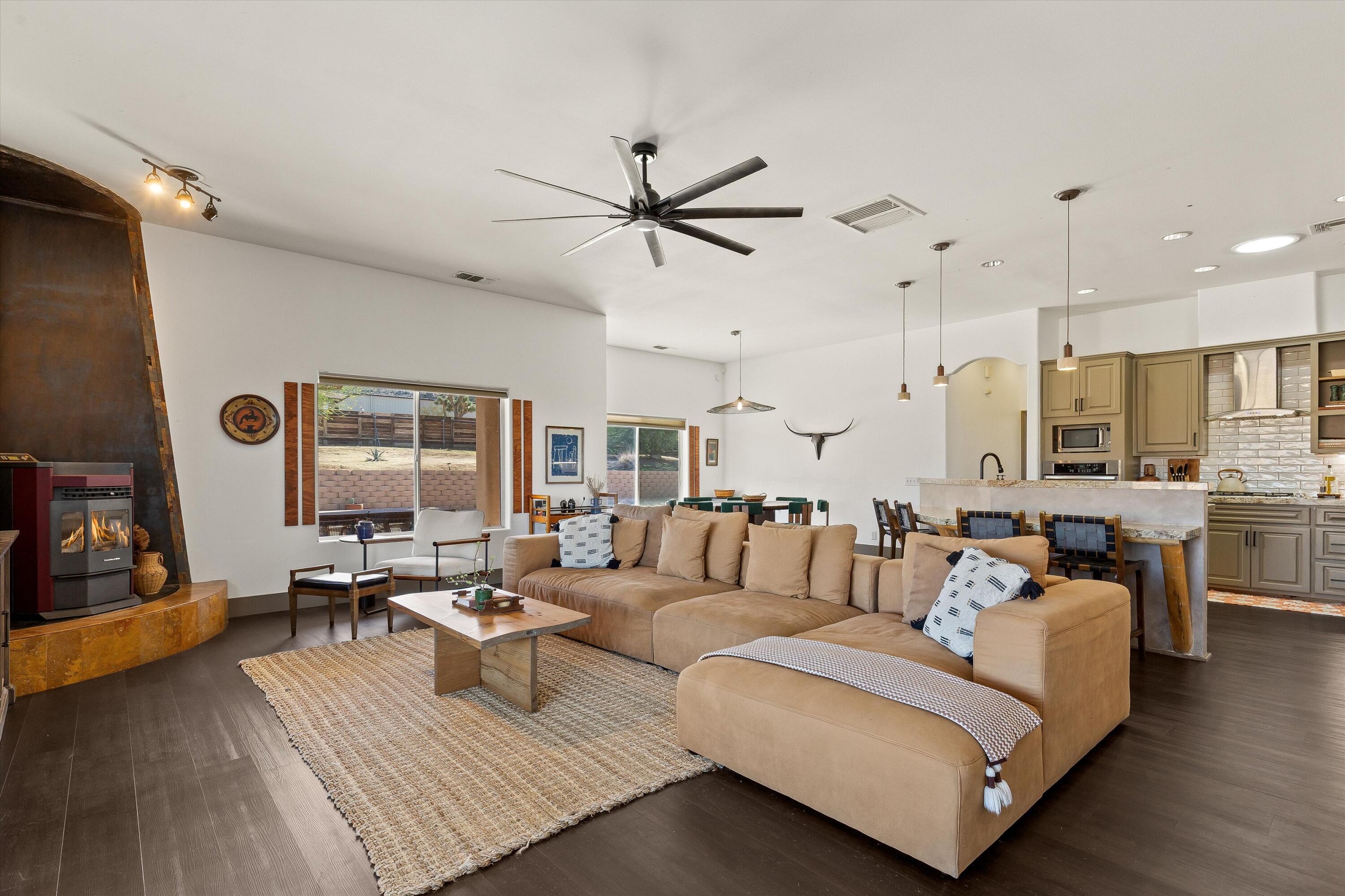 60377 Pueblo Trail Joshua Tree, CA 92252 - Photo 10 of 57 a living room with furniture kitchen view and a large window