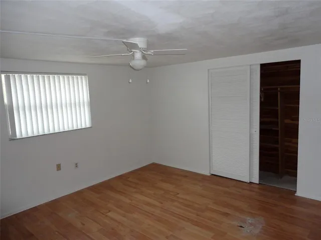 an empty room with windows