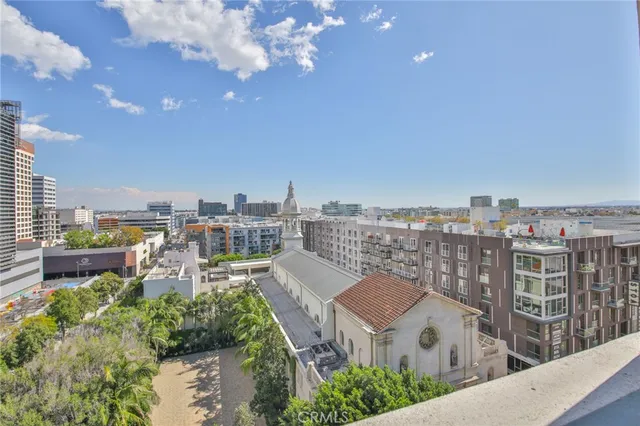 a view of a city with tall buildings