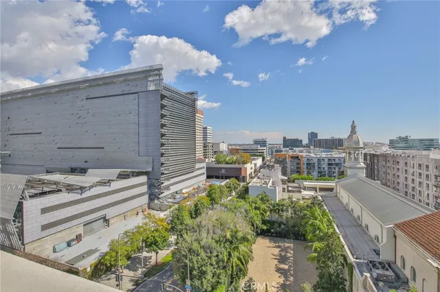 a view of city with tall buildings