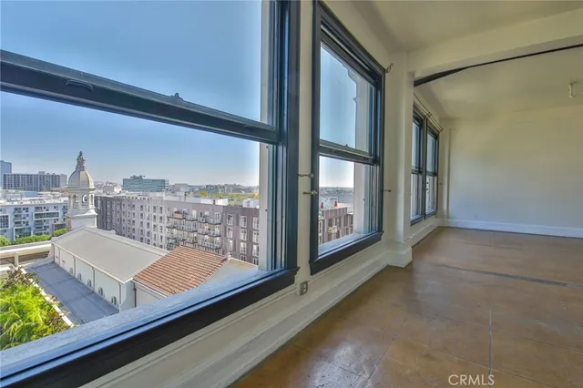 a kitchen with stainless steel appliances a stove a microwave and a refrigerator