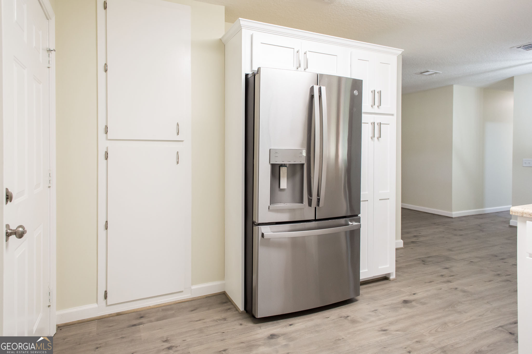 6731 Youmans Chapel Road Blackshear, GA 31516 - Photo 15 of 33 a view of kitchen with stainless steel appliances wooden floor