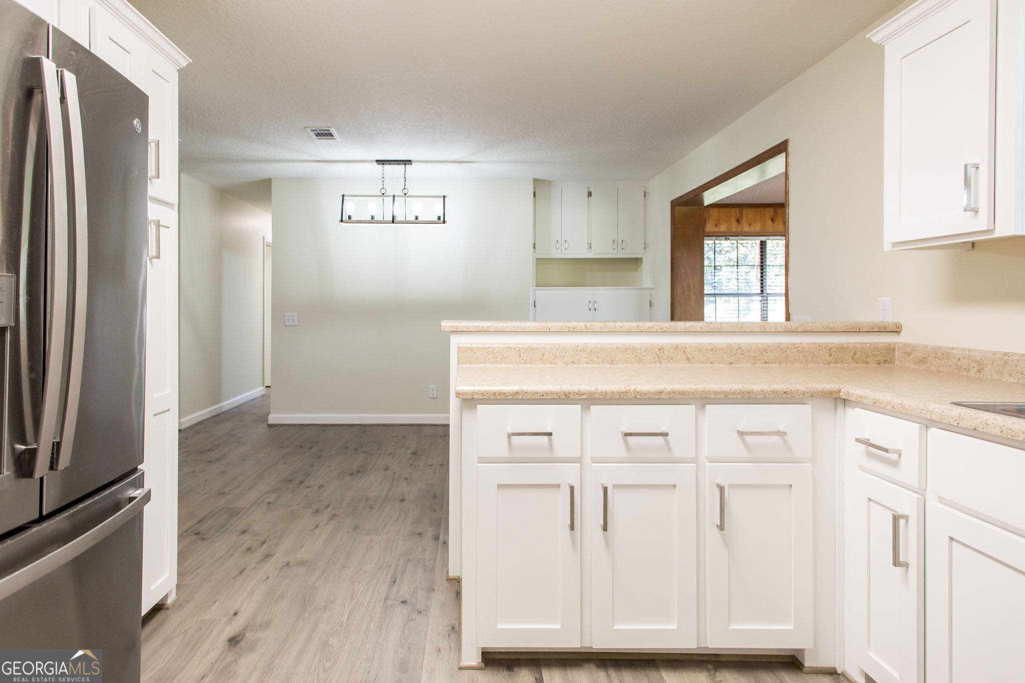 6731 Youmans Chapel Road Blackshear, GA 31516 - Photo 19 of 33 a view of cabinets with wooden floor