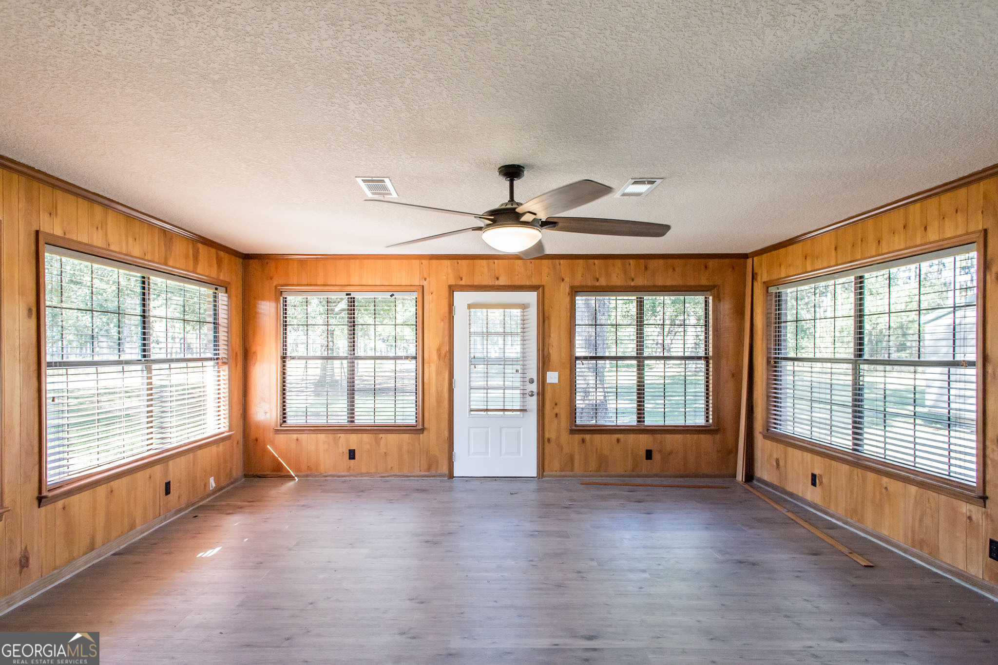 6731 Youmans Chapel Road Blackshear, GA 31516 - Photo 21 of 33 a view of an empty room with a window