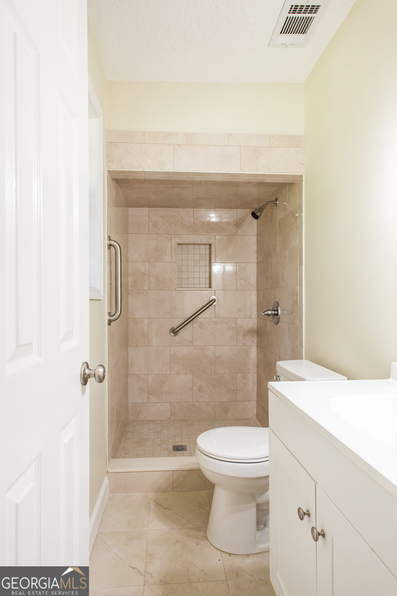 6731 Youmans Chapel Road Blackshear, GA 31516 - Photo 33 of 33 a bathroom with a shower a toilet and a sink