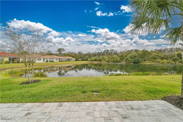 a view of a lake with a big yard