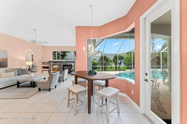 a outdoor space with patio the couches and a dining table with garden view