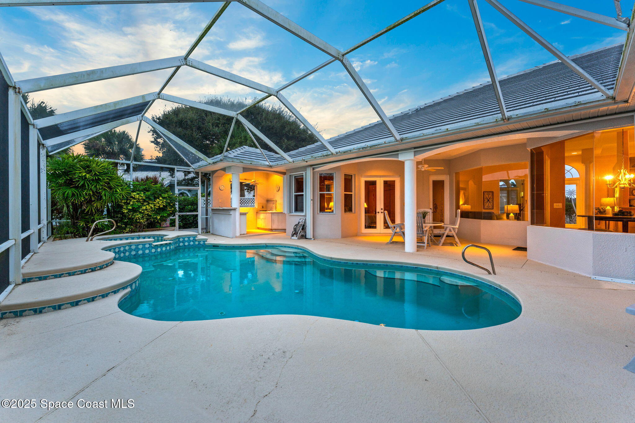 235 Loggerhead Drive Melbourne Beach, FL 32951 - Photo 38 of 50 an outdoor view of a swimming pool