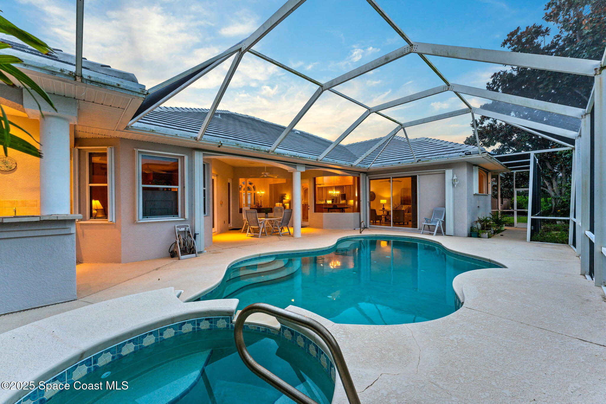 235 Loggerhead Drive Melbourne Beach, FL 32951 - Photo 4 of 50 a view of swimming pool with outdoor seating