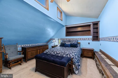 a bathroom with a sink a vanity and a mirror