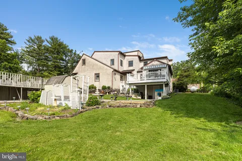 a view of a storage room with a table and chairs