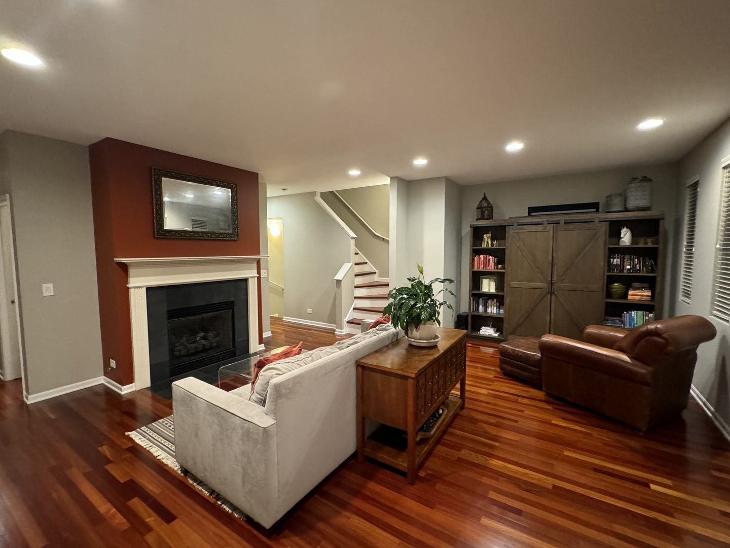 4535 West Irving Park Road Chicago, IL 60641 - Photo 5 of 15 a living room with furniture and a fireplace