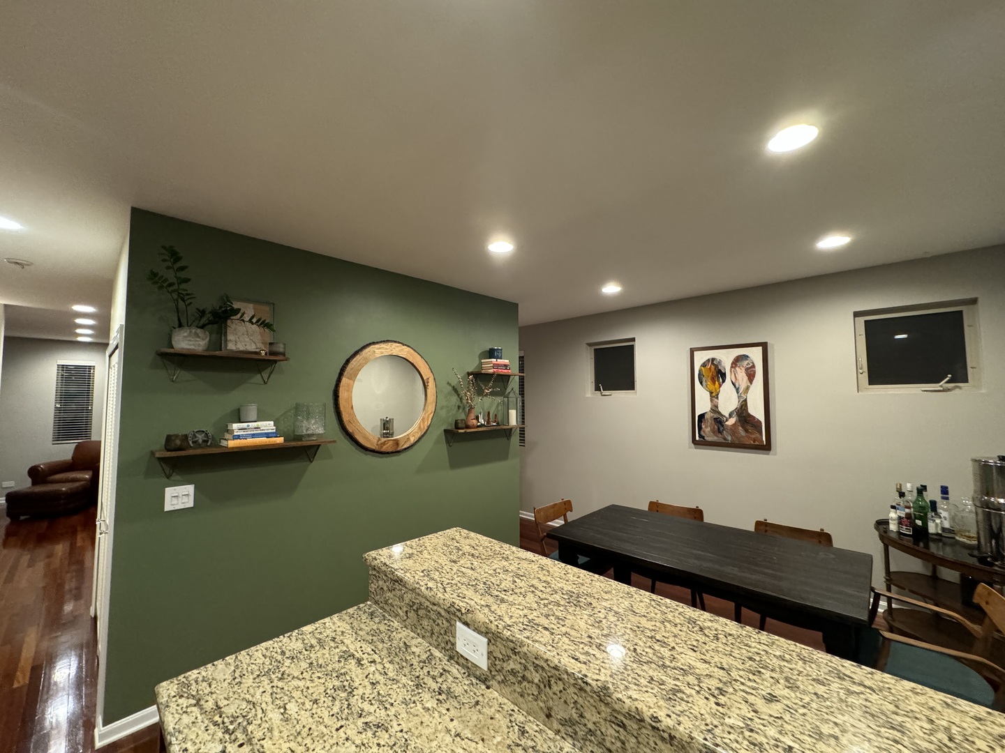 4535 West Irving Park Road Chicago, IL 60641 - Photo 8 of 15 a bedroom with a bed and a wall mirror
