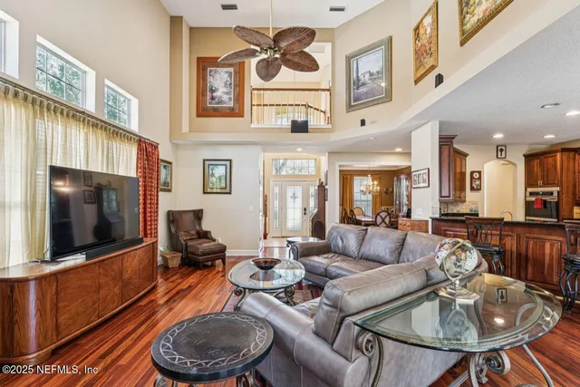 a living room with furniture and a table