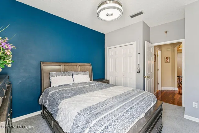 a view of a hallway with windows