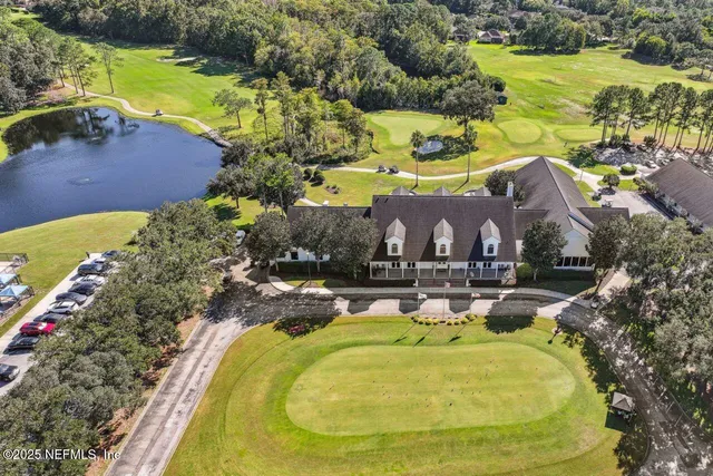 a view of a park with large trees