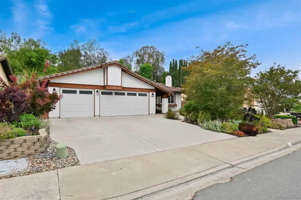 a house with trees in the background