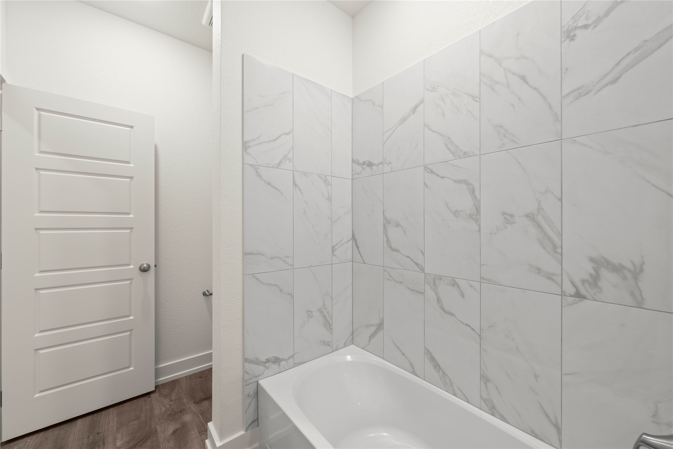 564 Gus Loop Georgetown, TX 78626 - Photo 25 of 32 a bathroom with a bathtub
