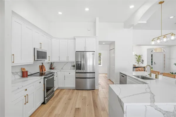 a bathroom with a sink double vanity and a mirror