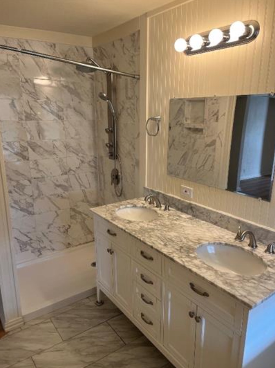 230 Six Pines Road San Marcos, TX 78666 - Photo 11 of 21 a bathroom with a granite countertop sink a mirror and shower