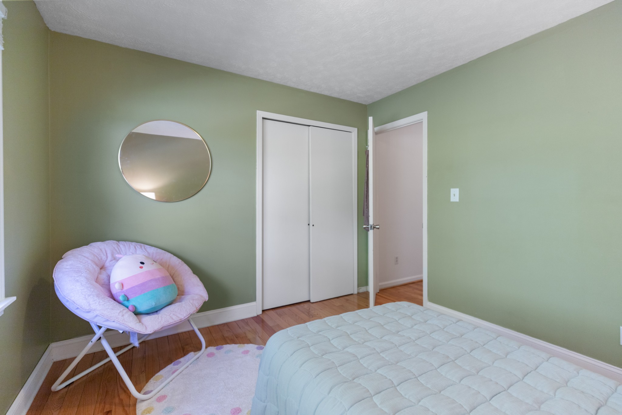 1380 Cowan Road Dickson, TN 37055 - Photo 27 of 61 a bedroom with a bed and a chandelier