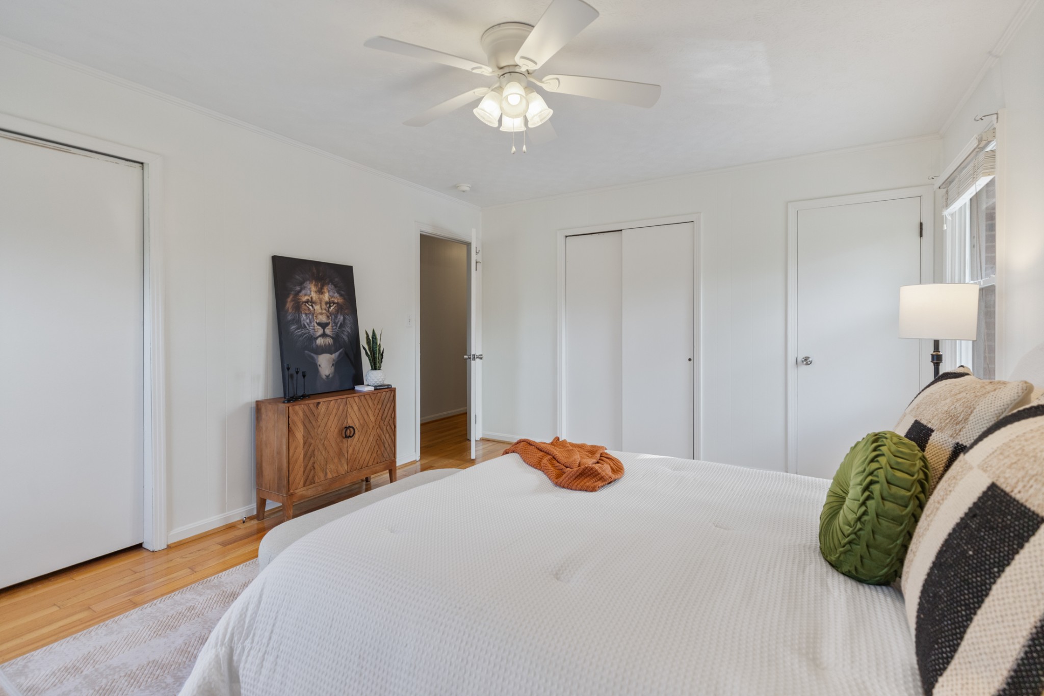 1380 Cowan Road Dickson, TN 37055 - Photo 30 of 61 a bedroom with a bed and a chandelier