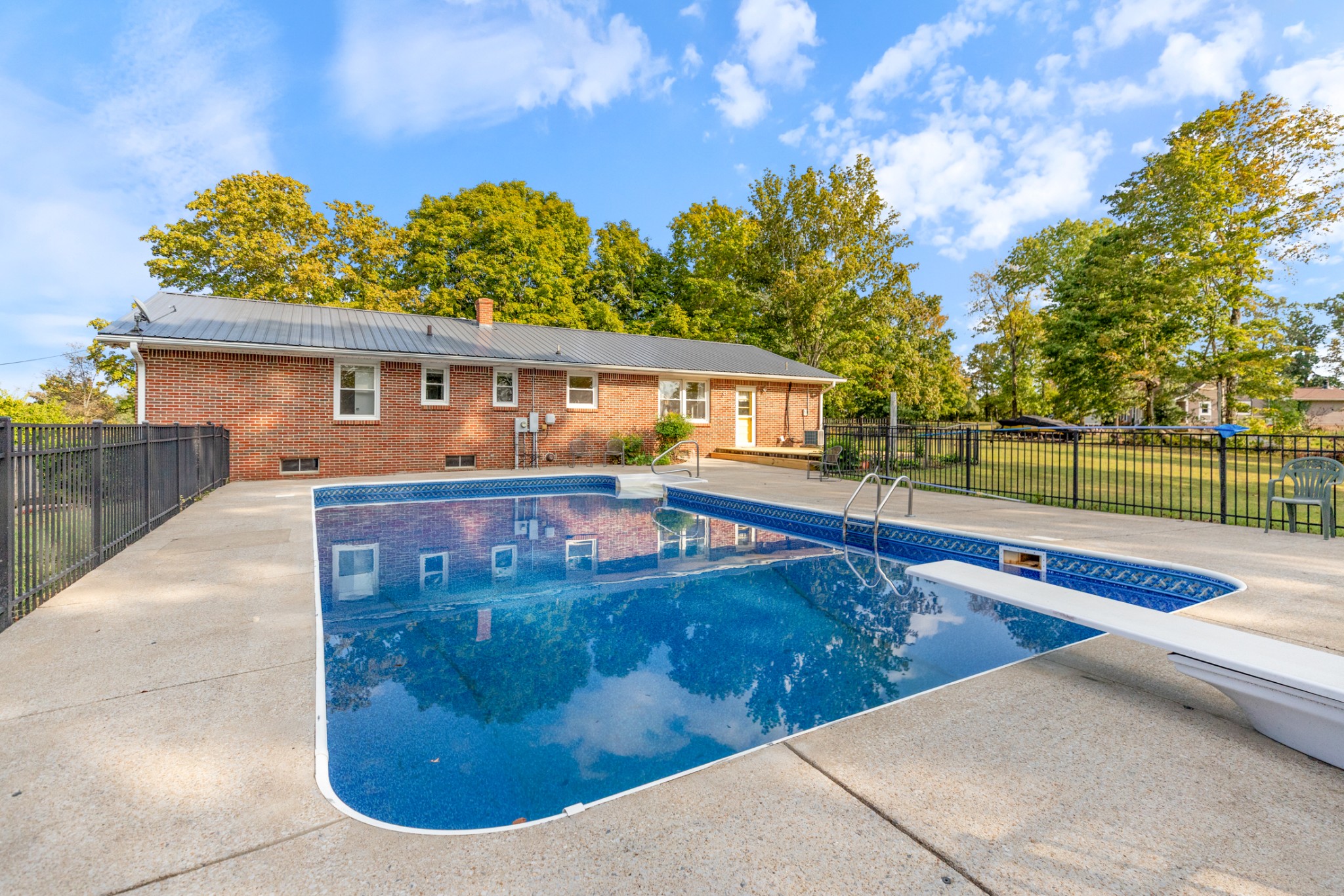 1380 Cowan Road Dickson, TN 37055 - Photo 41 of 61 a view of a house with a swimming pool