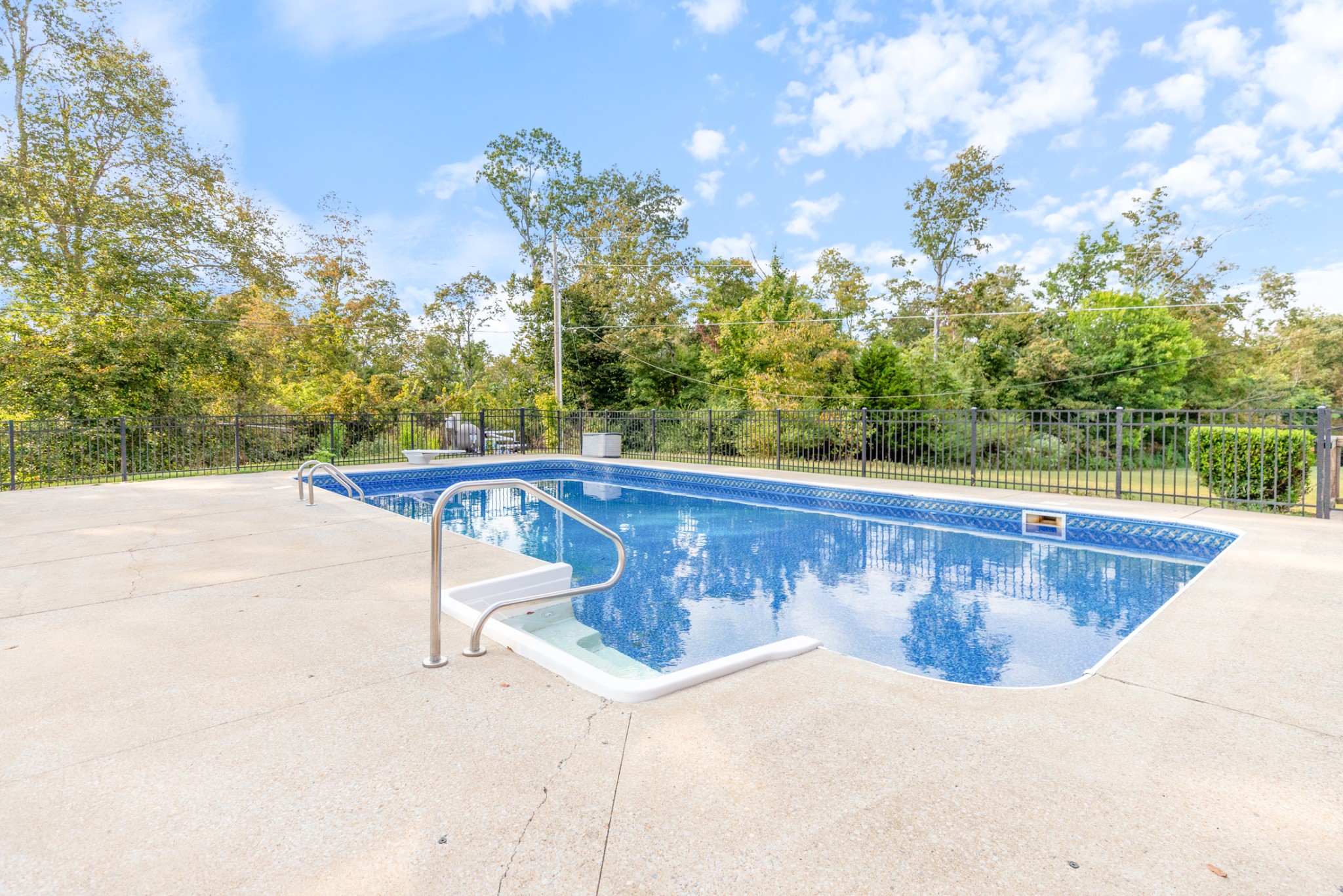 1380 Cowan Road Dickson, TN 37055 - Photo 43 of 61 a view of a swimming pool with a yard