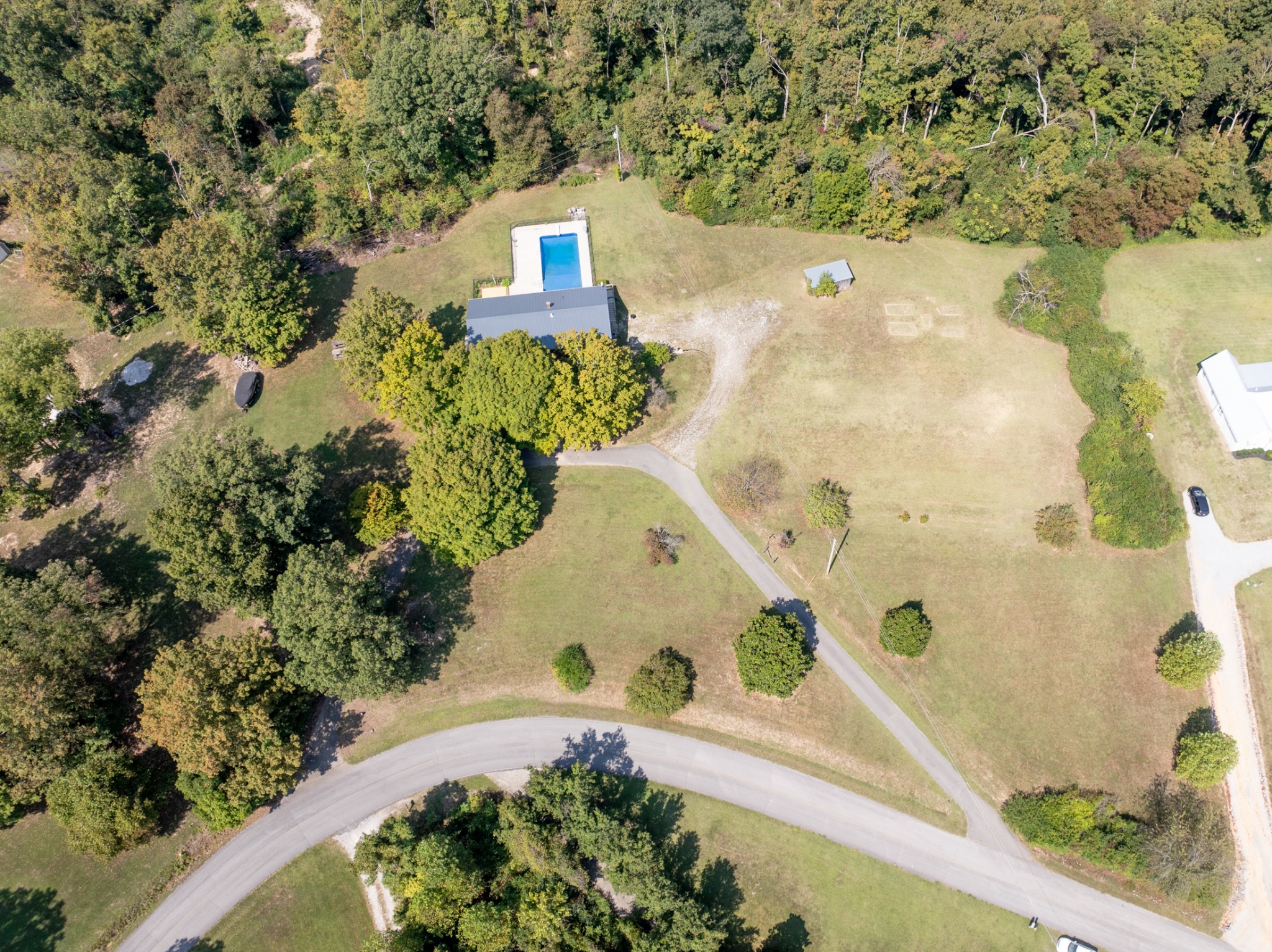 1380 Cowan Road Dickson, TN 37055 - Photo 51 of 61 an aerial view of a house with a yard and trees