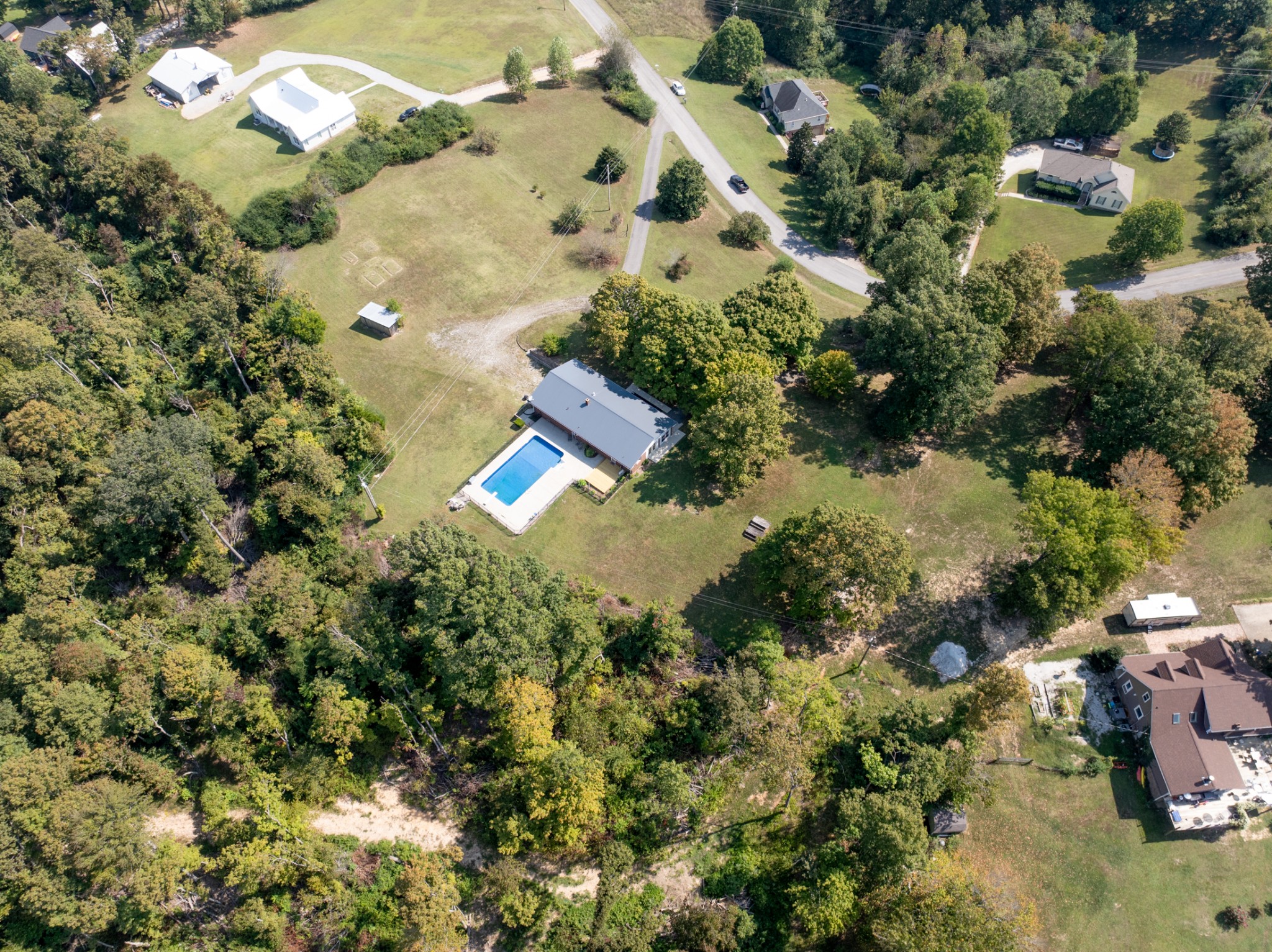 1380 Cowan Road Dickson, TN 37055 - Photo 53 of 61 an aerial view of a house with a yard and lake view