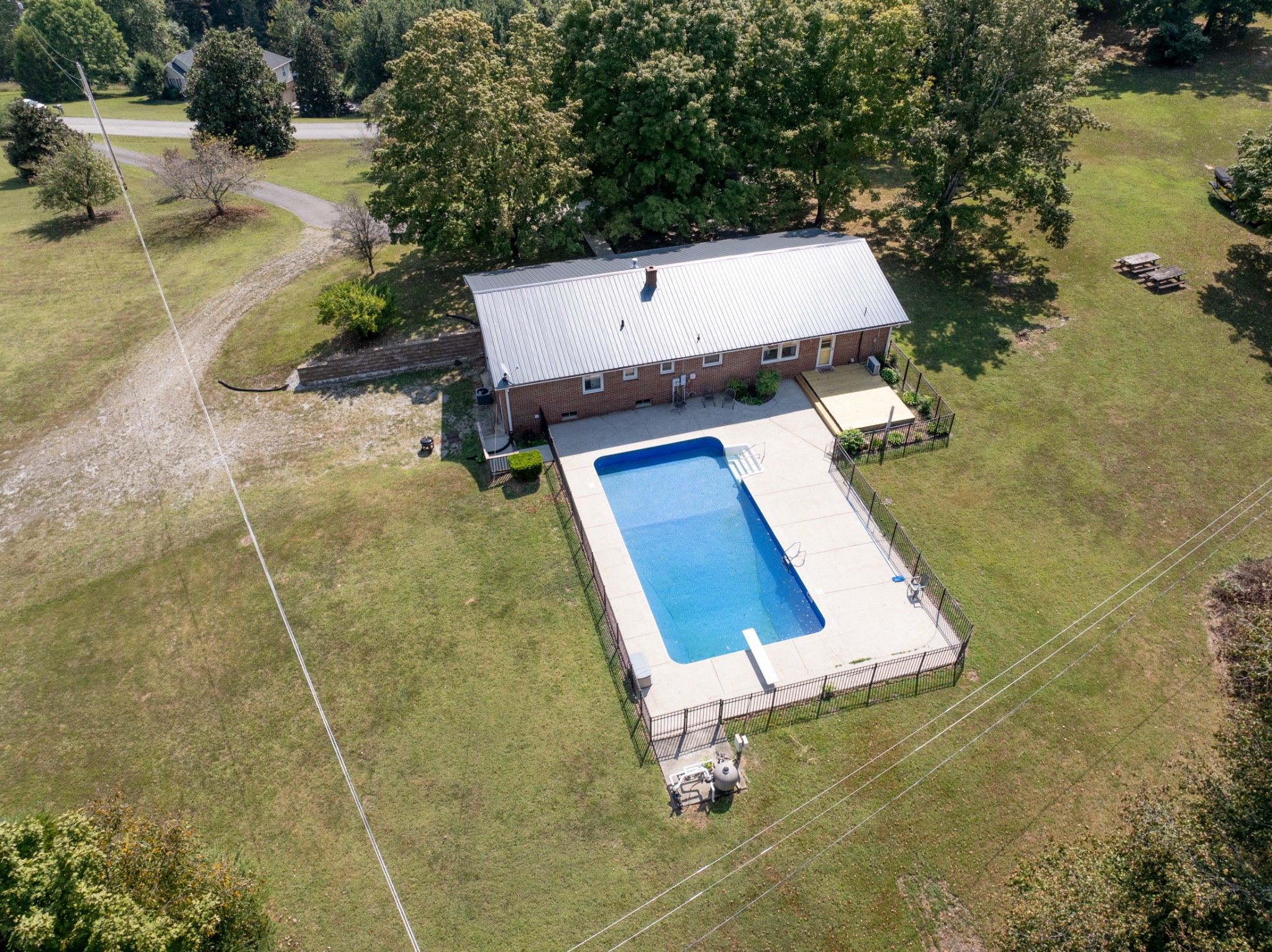 1380 Cowan Road Dickson, TN 37055 - Photo 60 of 61 an aerial view of a house with a yard and lake view