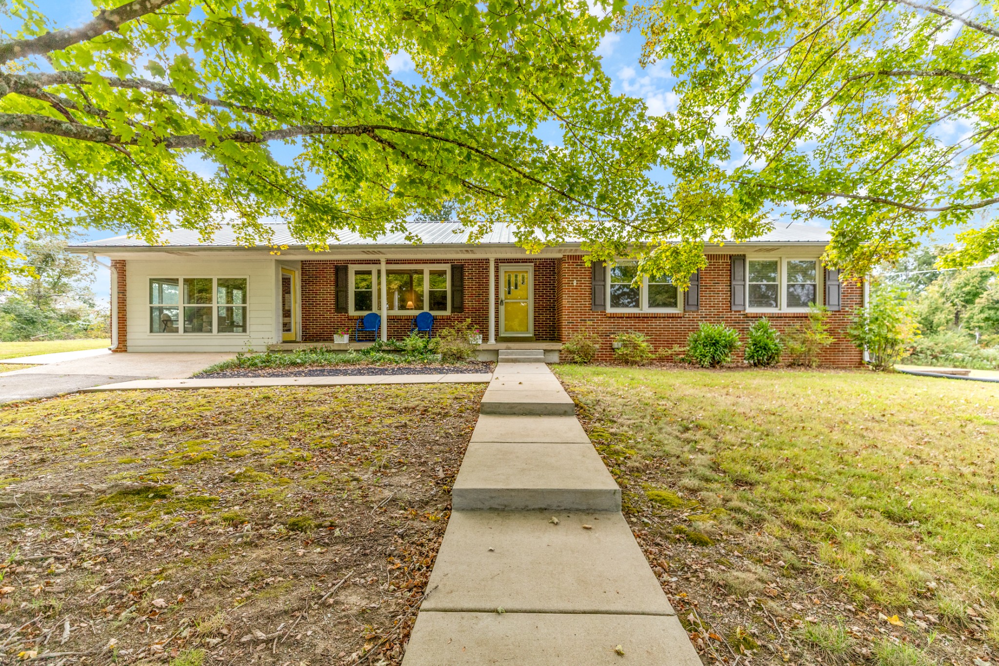 1380 Cowan Road Dickson, TN 37055 - Photo 6 of 61 a front view of a house with a yard