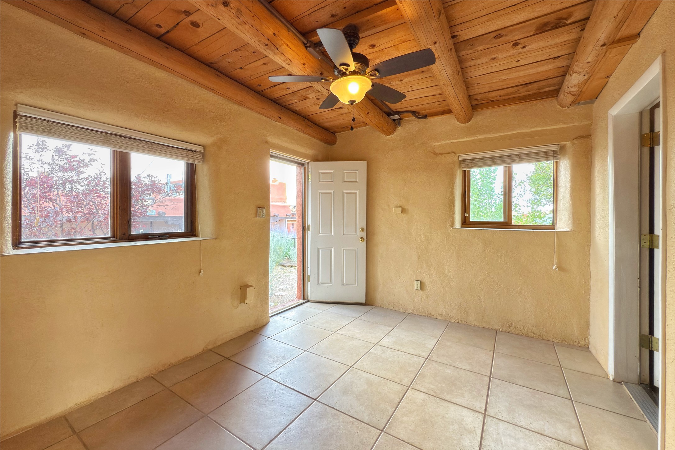 54 Rons Road Santa Fe, NM 87508 - Photo 86 of 99 CASITA: Bedroom with direct access to pool area.