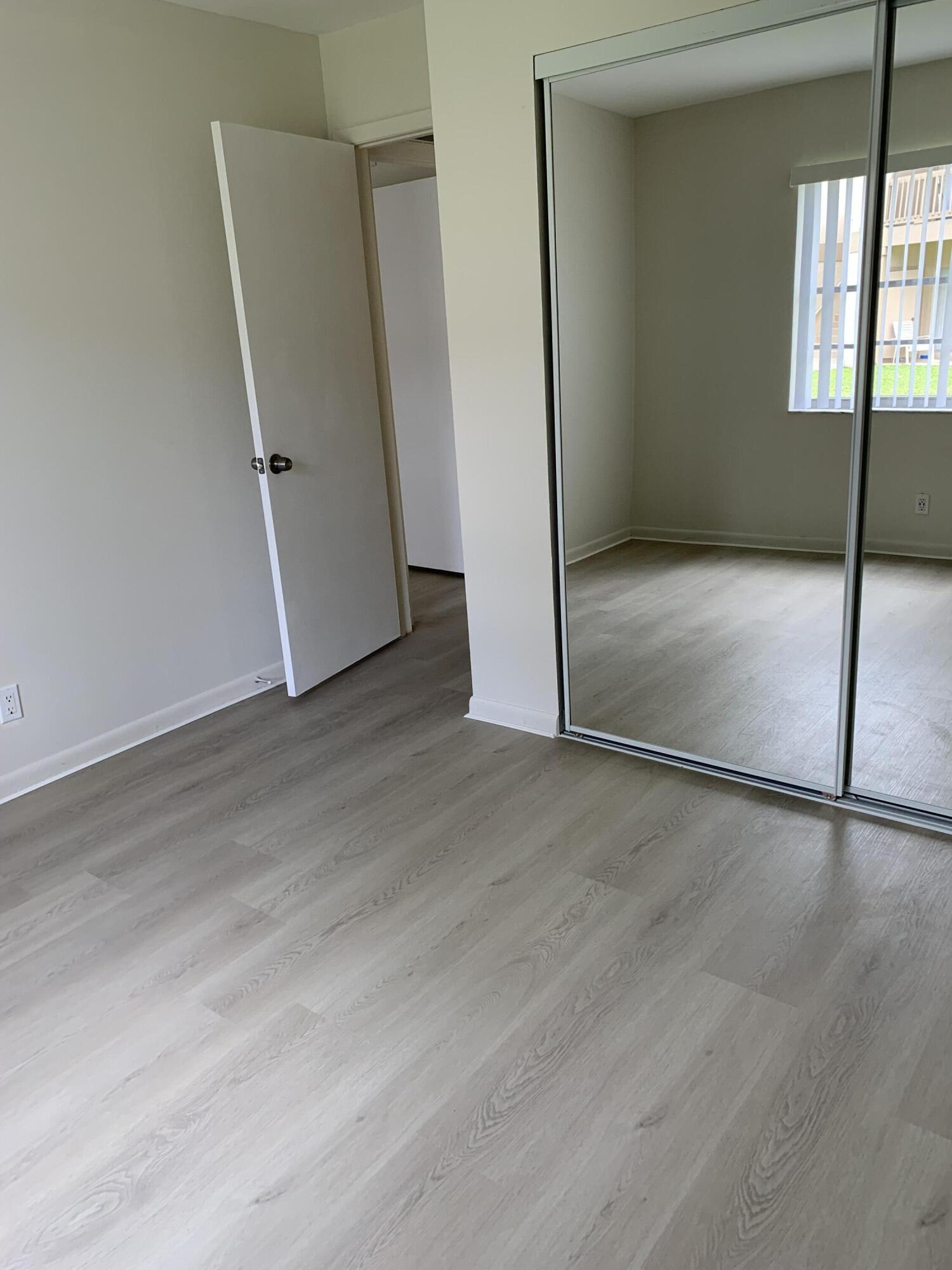1814 Abbey Road, Unit 103 West Palm Beach, FL 33415 - Photo 3 of 16 IMG_0690