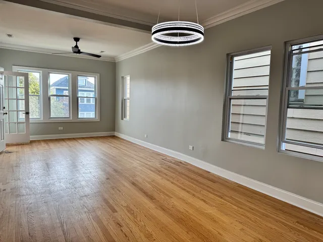 a stove top oven sitting inside of a kitchen
