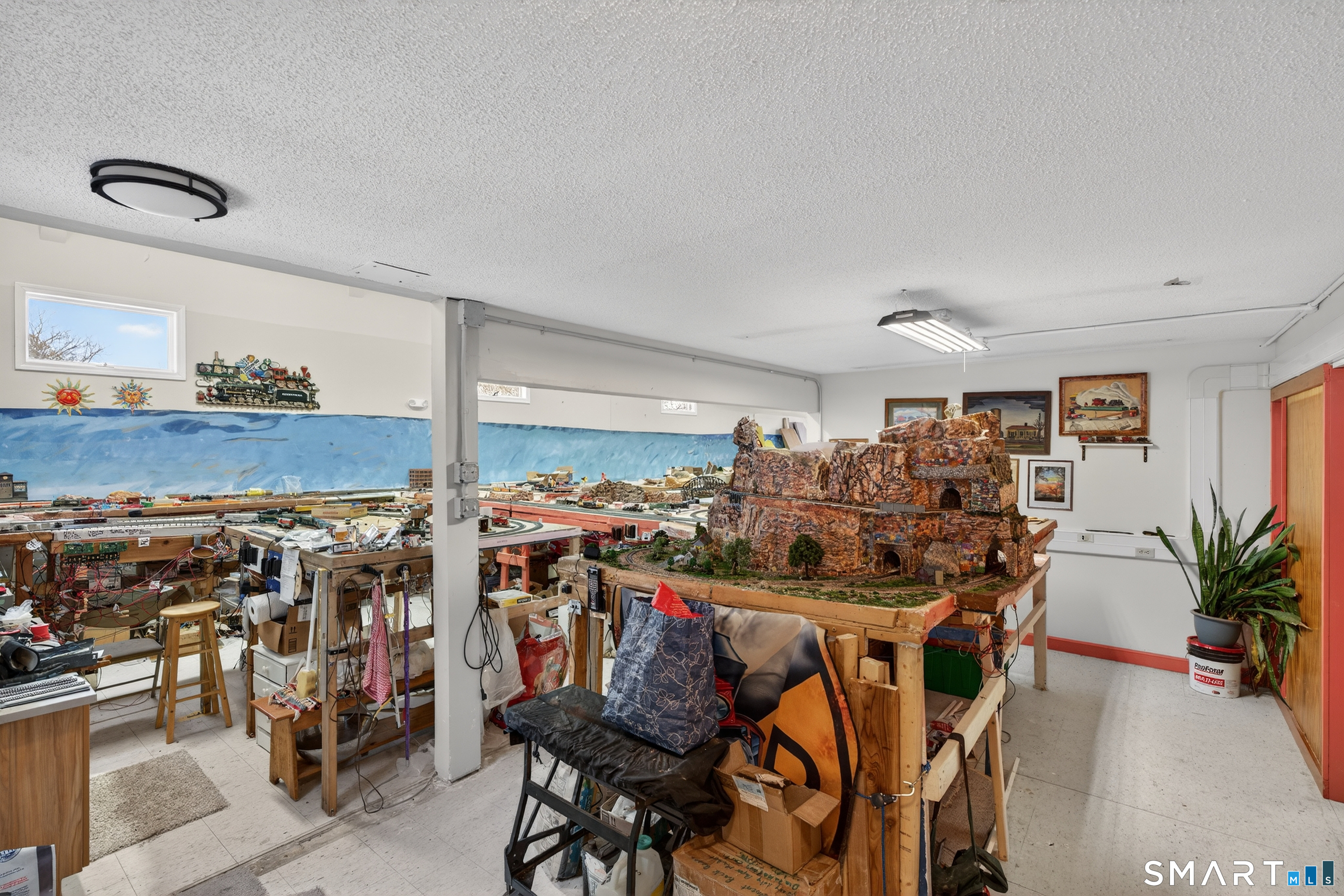 1553 Glasgo Road Griswold, CT 06351 - Photo 24 of 37 a view of a dining room with furniture and chandelier