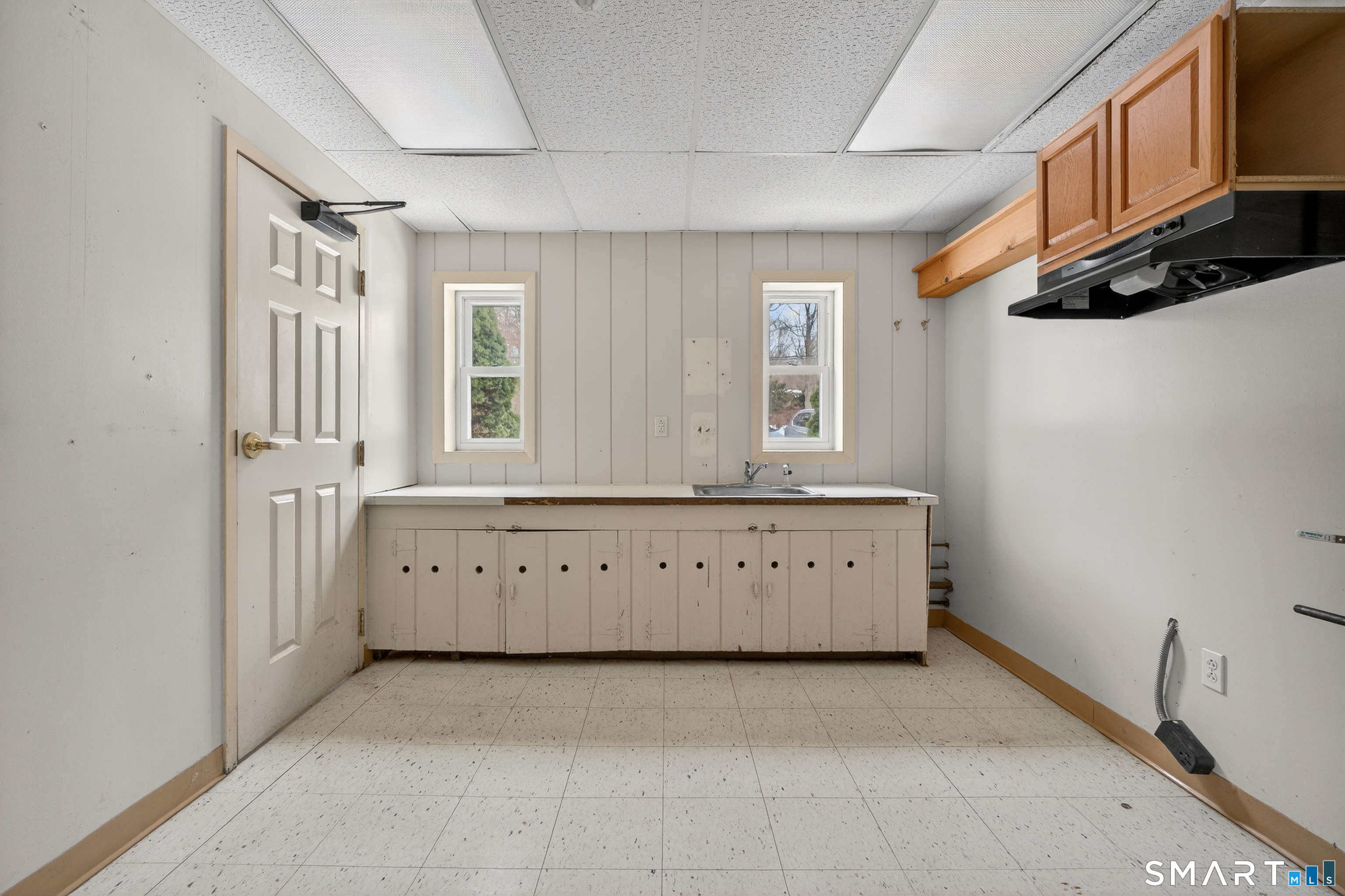 1553 Glasgo Road Griswold, CT 06351 - Photo 30 of 37 a room with a window and a dresser