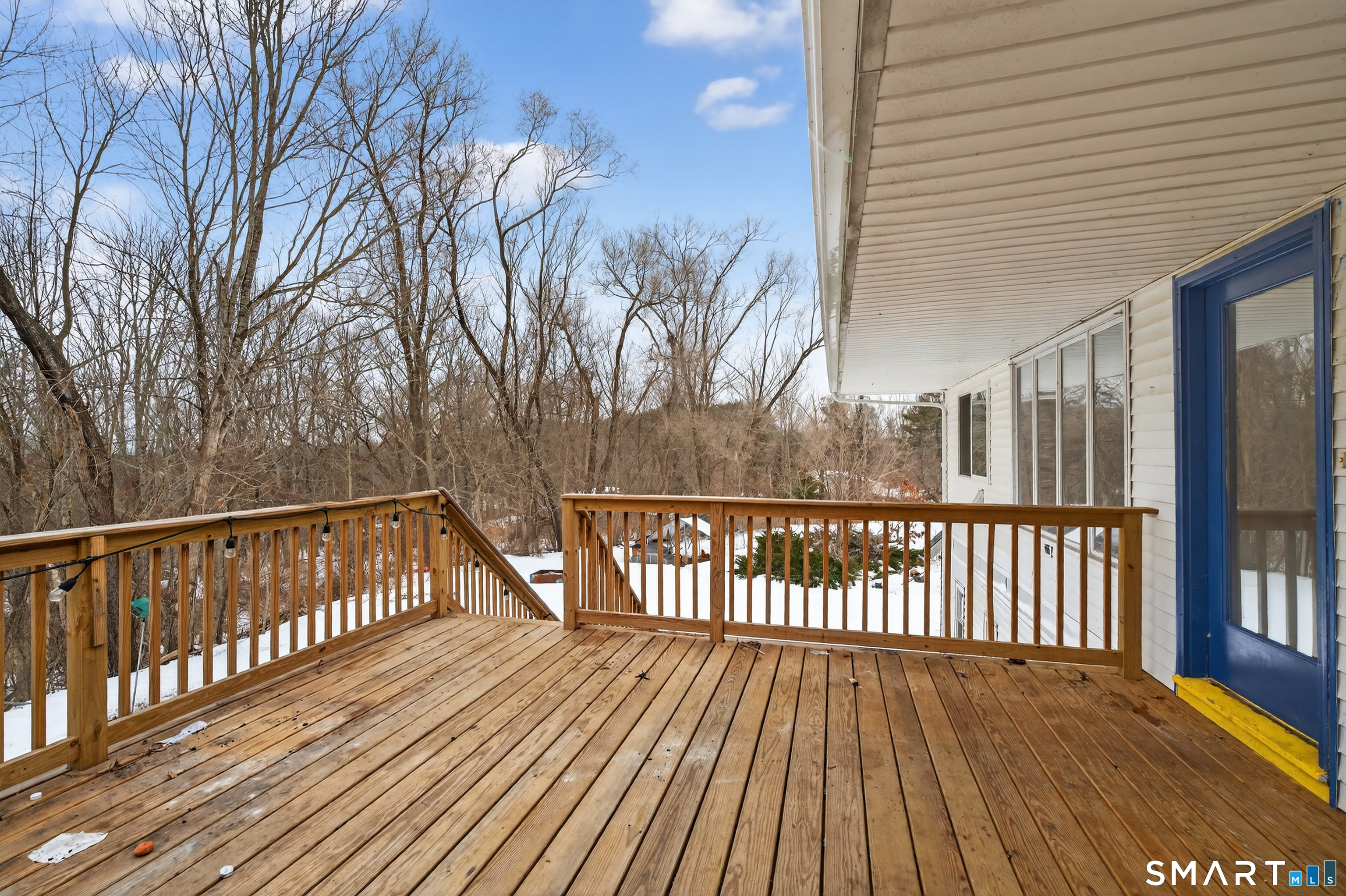 1553 Glasgo Road Griswold, CT 06351 - Photo 36 of 37 a view of balcony with wooden floor and fence