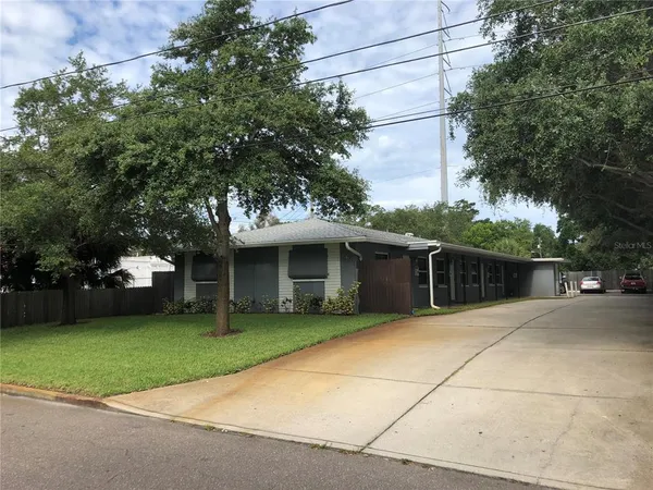 a view of a house with a garden