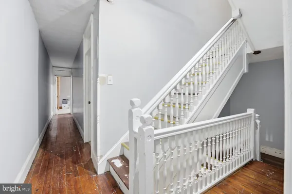 a view of entryway with wooden floor