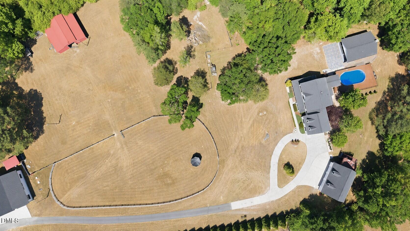 5416 Pulley Town Road Zebulon, NC 27597 - Photo 41 of 74 an aerial view of a swimming pool