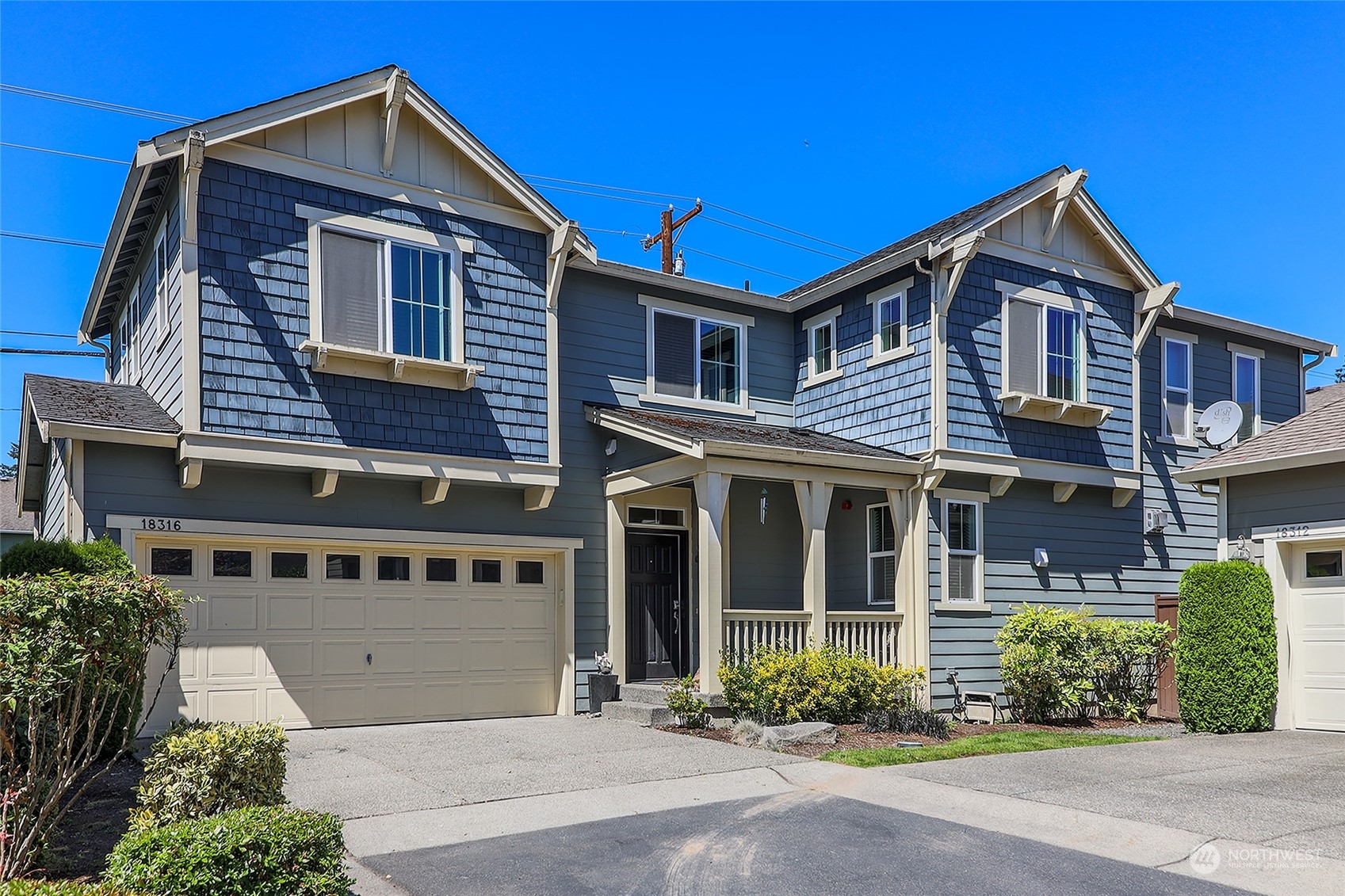 18316 35th Drive Southeast Bothell, WA 98012 - Photo 1 of 26 a front view of a house with garden