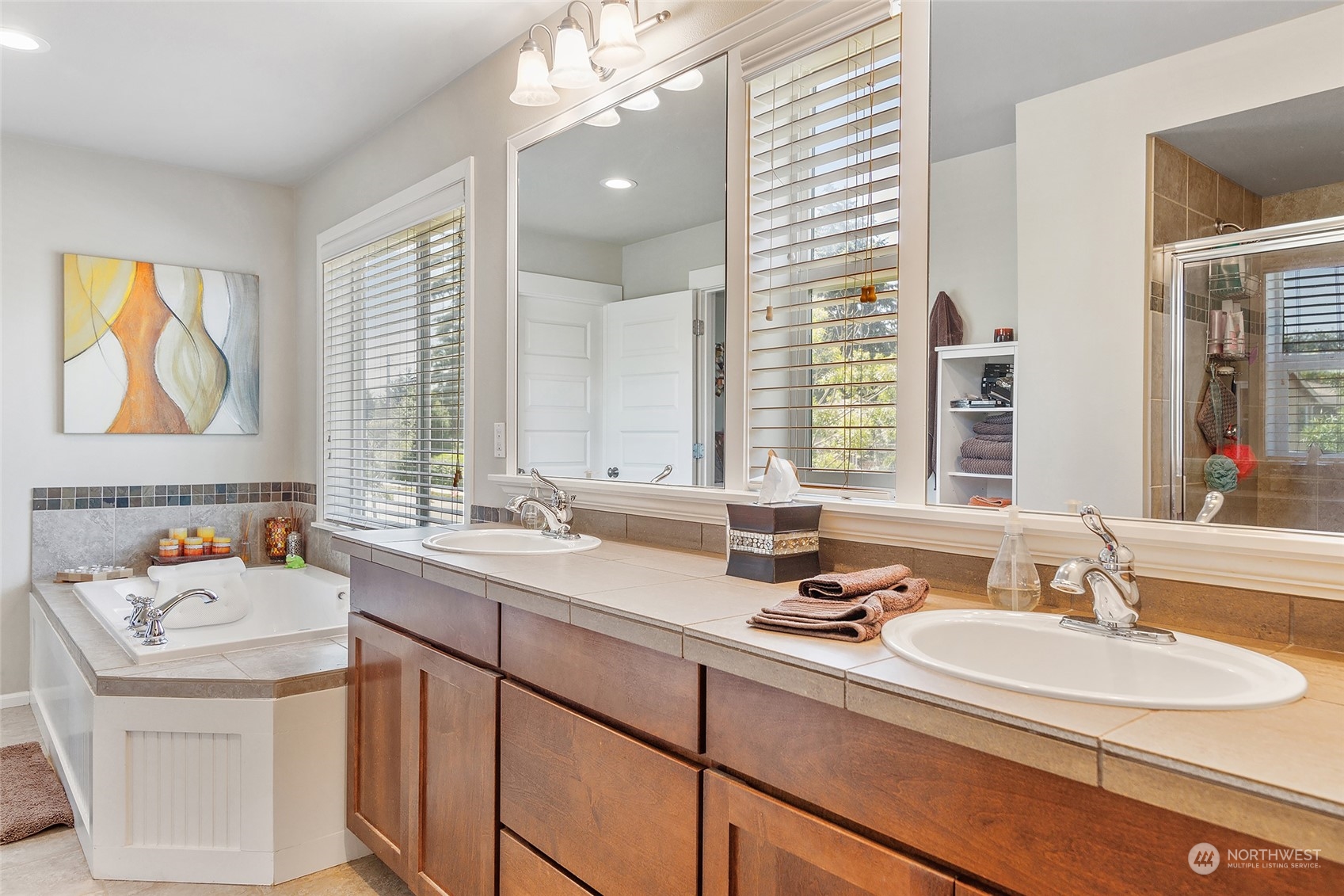 18316 35th Drive Southeast Bothell, WA 98012 - Photo 16 of 26 a bathroom with a sink double vanity and a mirror