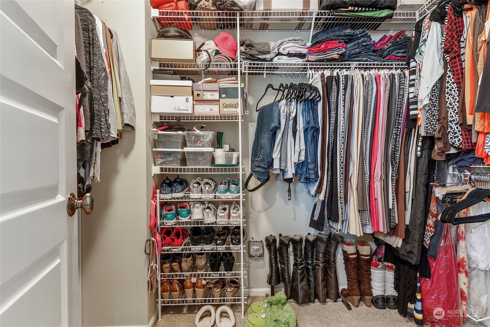 18316 35th Drive Southeast Bothell, WA 98012 - Photo 17 of 26 a view of walk in closet with clothes and shoes