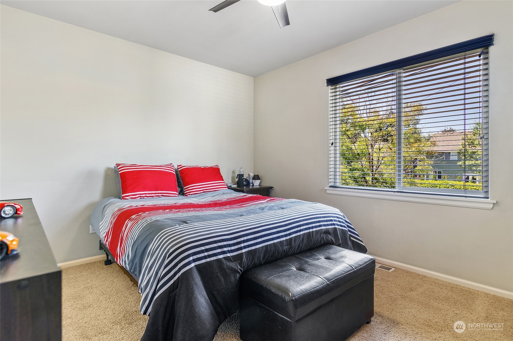 18316 35th Drive Southeast Bothell, WA 98012 - Photo 19 of 26 a bedroom with a bed and a window