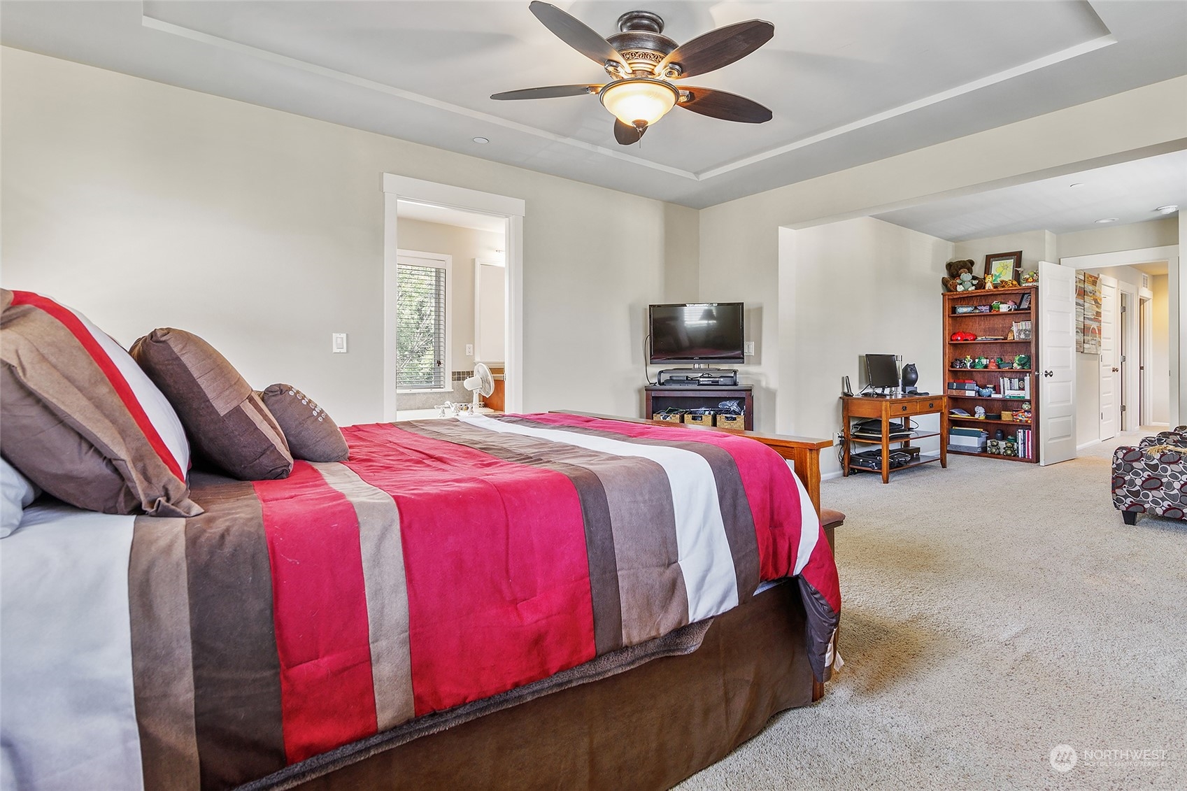 18316 35th Drive Southeast Bothell, WA 98012 - Photo 20 of 26 a bedroom with a bed and a chandelier