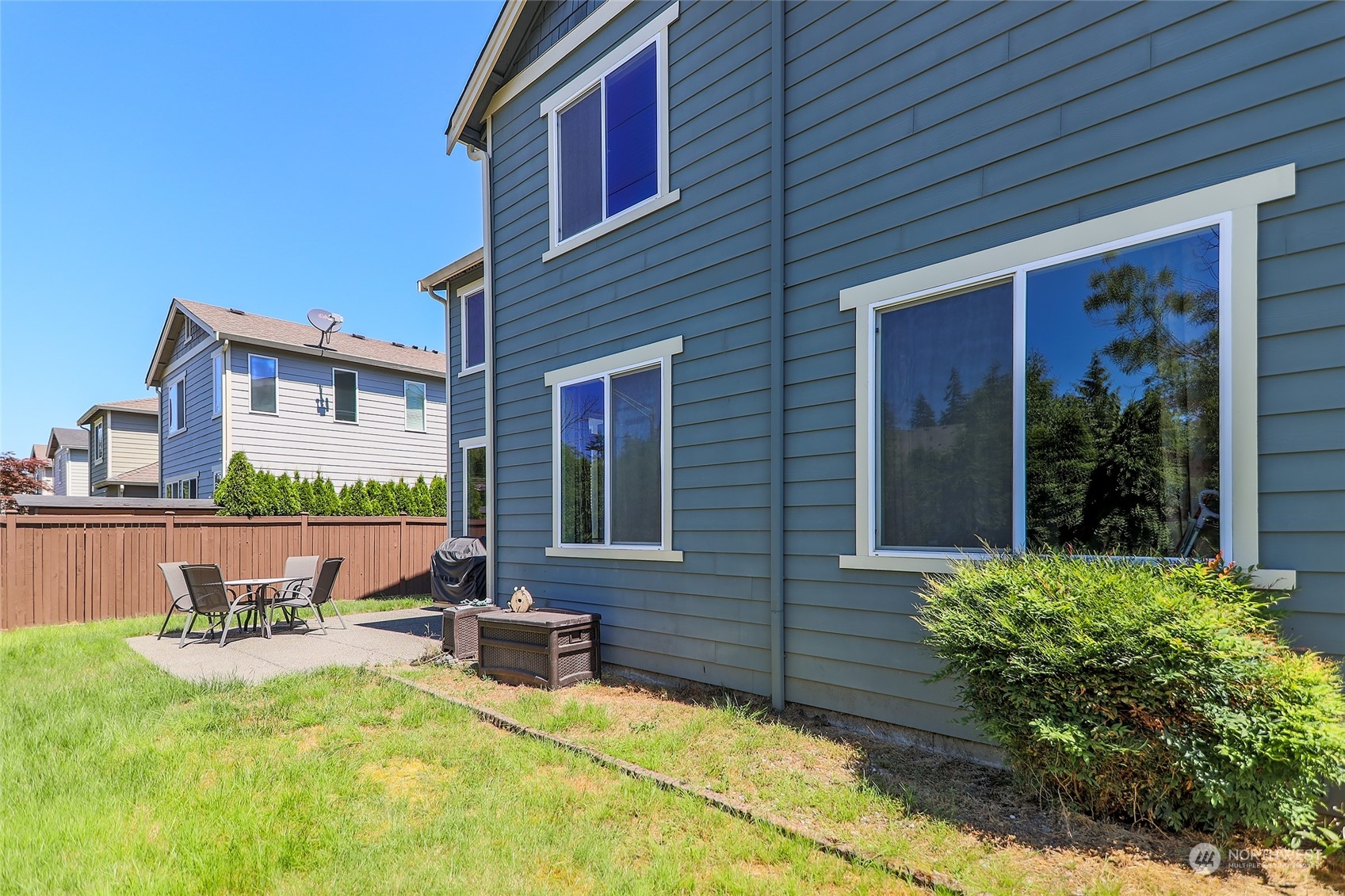 18316 35th Drive Southeast Bothell, WA 98012 - Photo 25 of 26 a swimming pool with outdoor seating and yard