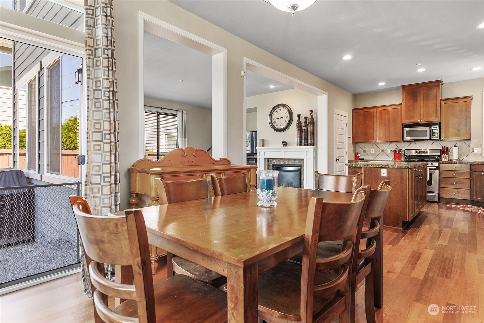 18316 35th Drive Southeast Bothell, WA 98012 - Photo 5 of 26 a view of a dining room with furniture and wooden floor