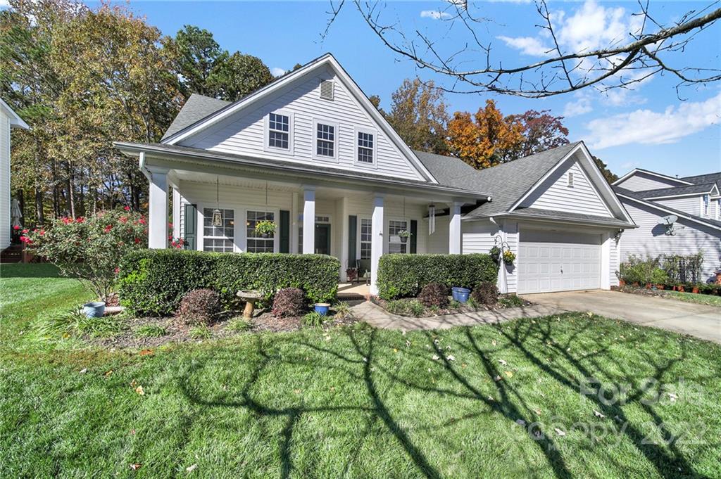 1640 Spandril Lane Fort Mill, SC 29708 - Photo 1 of 48 a front view of a house with a yard and potted plants
