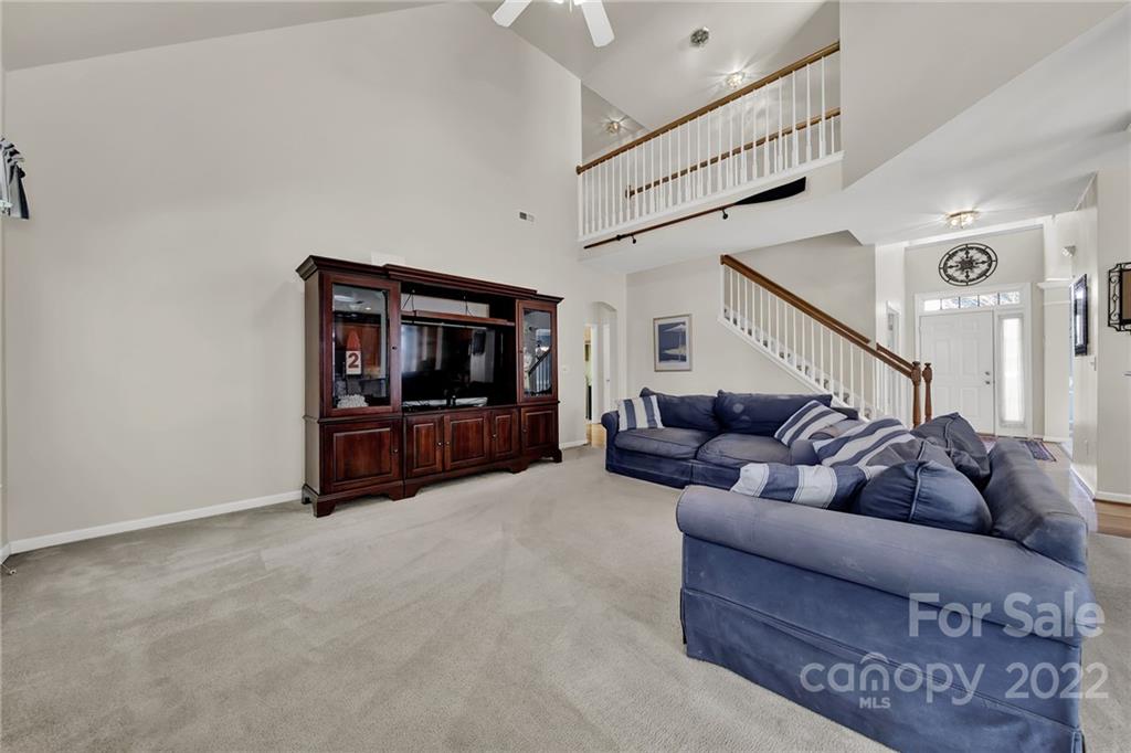 1640 Spandril Lane Fort Mill, SC 29708 - Photo 12 of 48 a living room with furniture and a flat screen tv